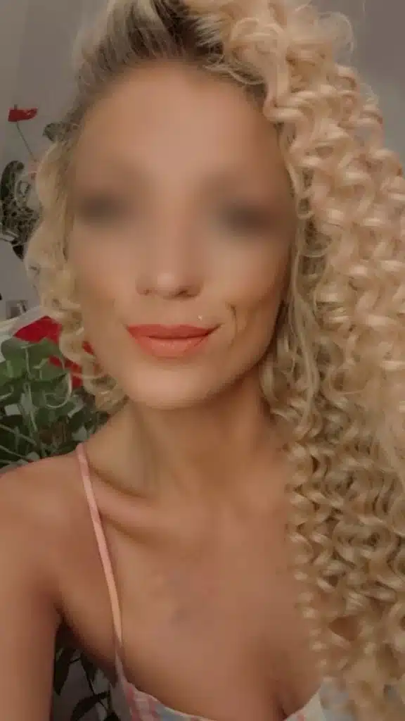 Jessy looks sexy as she stares into the camera with orange lips and pink underwear.