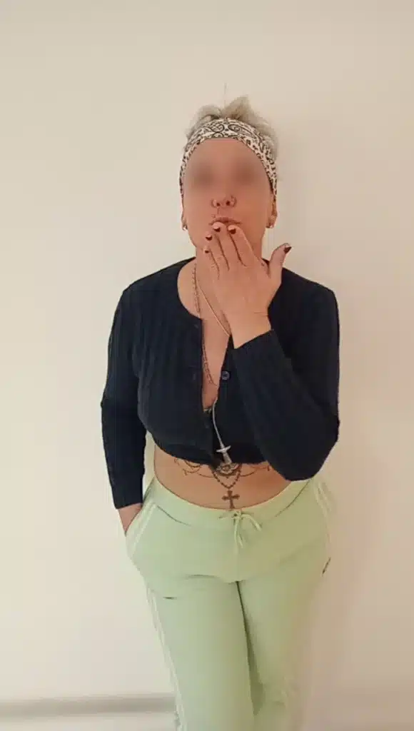 Livia blows a kiss to the camera